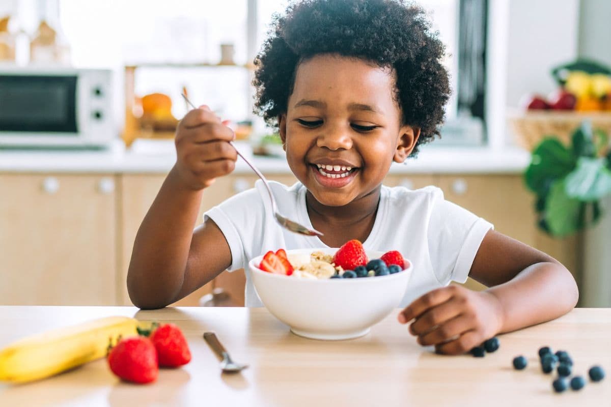 Child eating healthy food